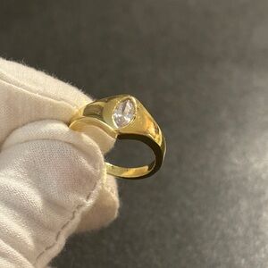 Gold plated ring with clear stone size 7